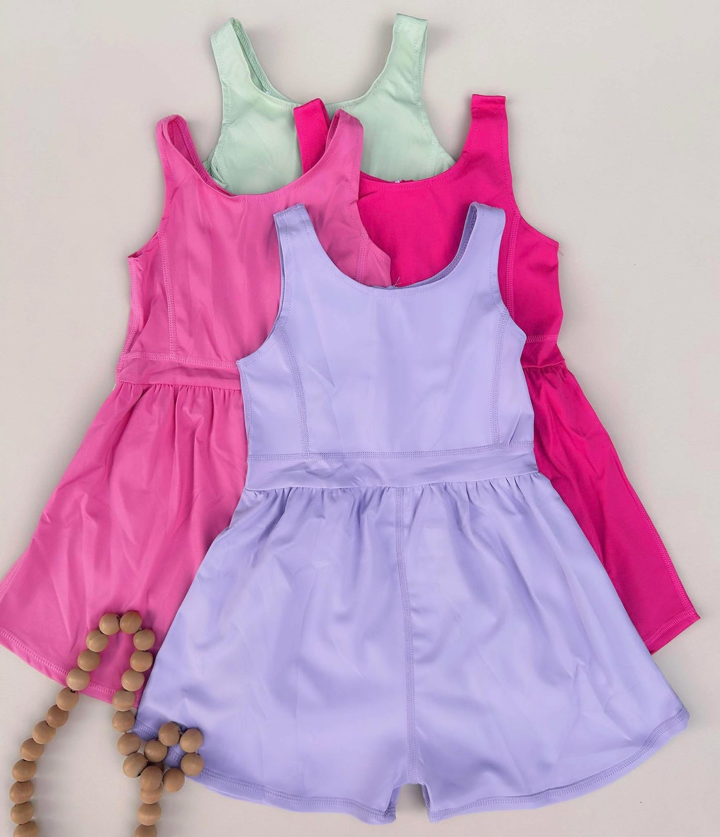 Pink romper athletic girls